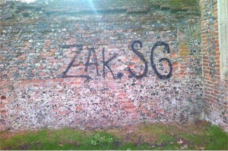 removing graffiti from stone wall UK